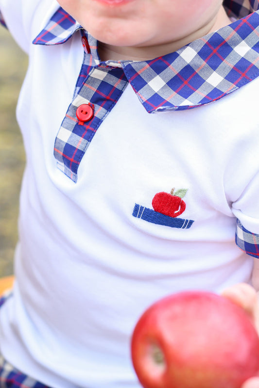 Close up shot of Apple of my Eye Boys Polo worn by model.